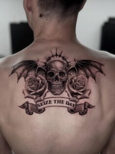 Custom skull and flowers tattoo.

For more info, DM me on my instagram or on my …