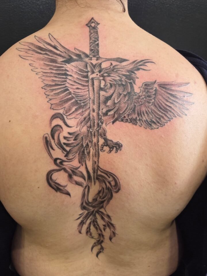 #pheonix #phoenixtattoo #backtattoo #blackink #tattoo…